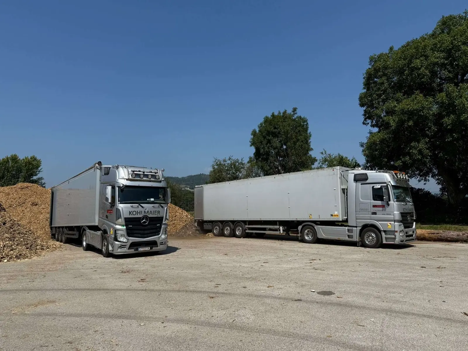 Kohlmaier trucks with box trailers